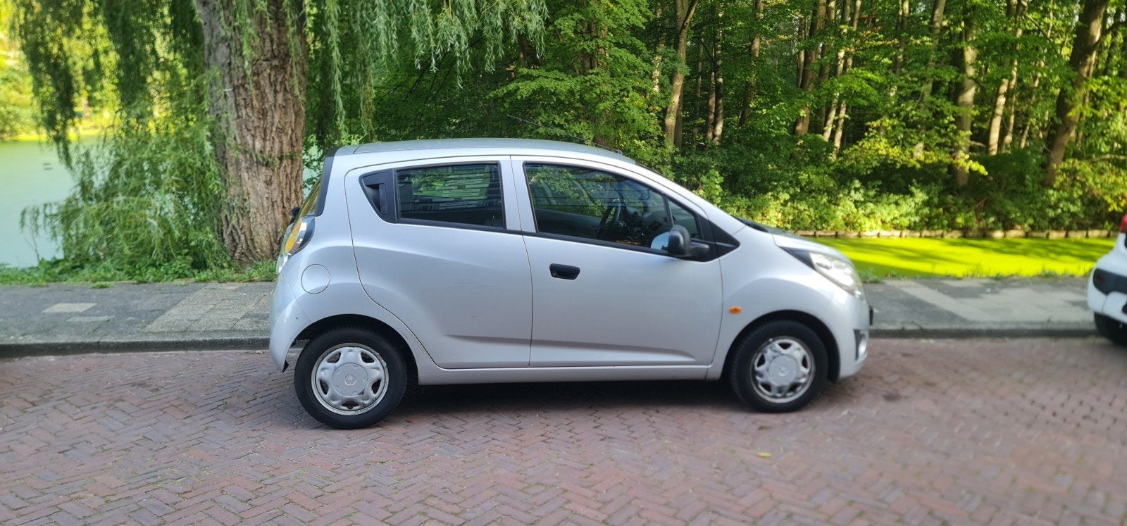 Chevrolet Spark 1.0 Bifuel 2011 Grijs 51.000 km, Auto's, Voorwielaandrijving, 839 kg, 4 cilinders, 68 pk