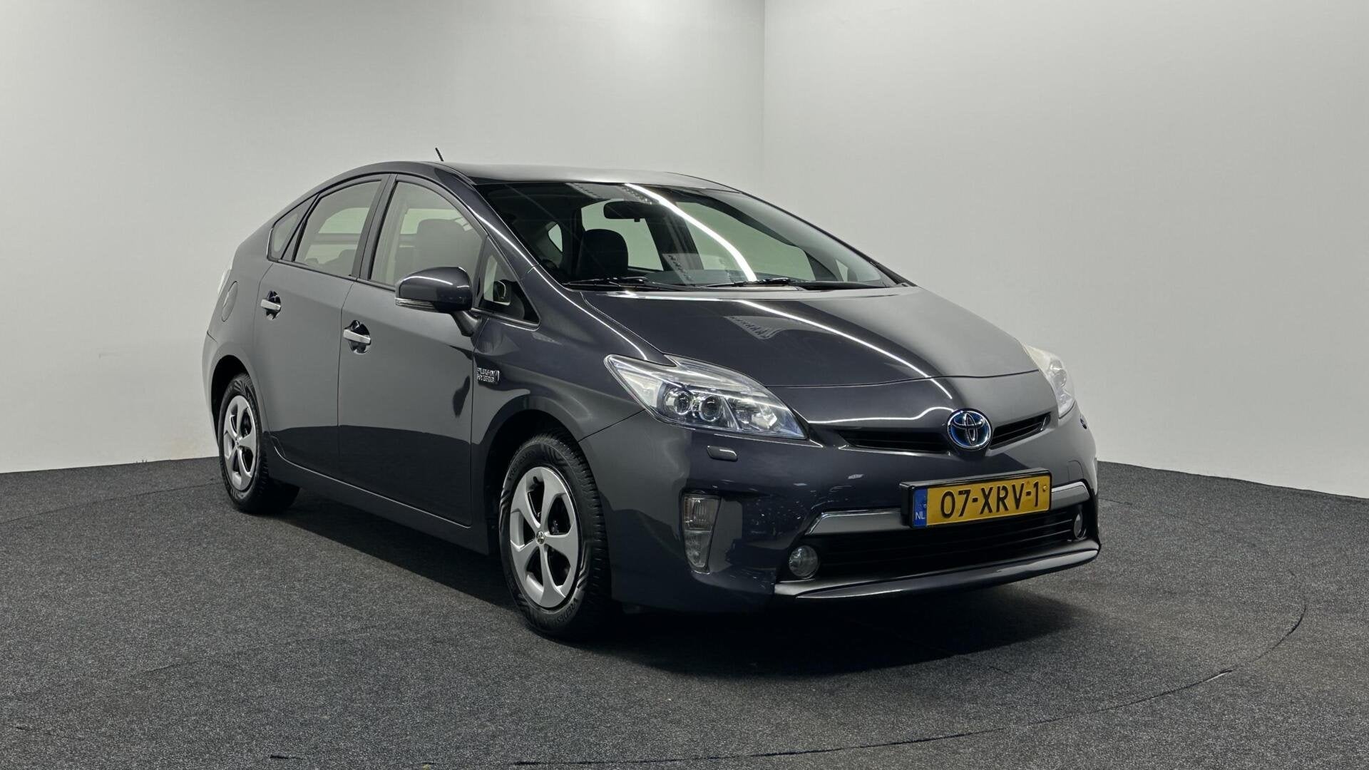 Toyota Prius 1.8 Plug-in Dynamic Business CAMERA NAVI ECC CR, Auto's, Euro 5, 136 pk, Gebruikt, Met garantie (alle)