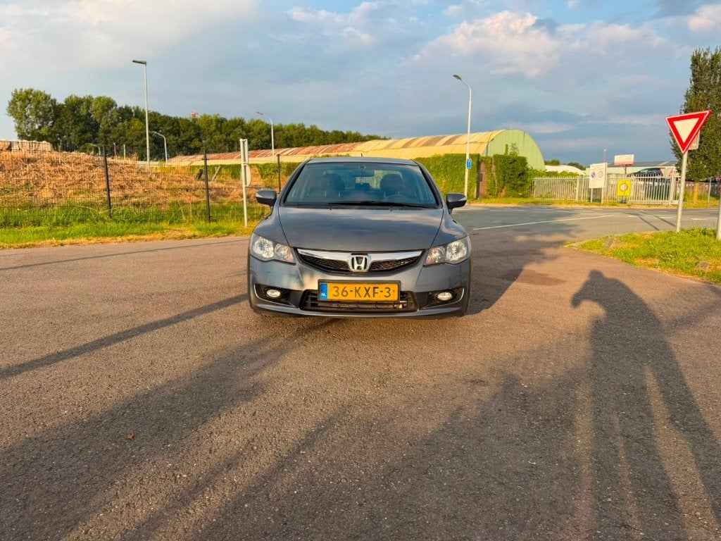 Honda Civic 1.3 Vtec Hybrid 4DR C-tr. 2010 Grijs, Auto's, Honda, Origineel Nederlands, Bedrijf, Hybride Elektrisch/Benzine, 22 km/l