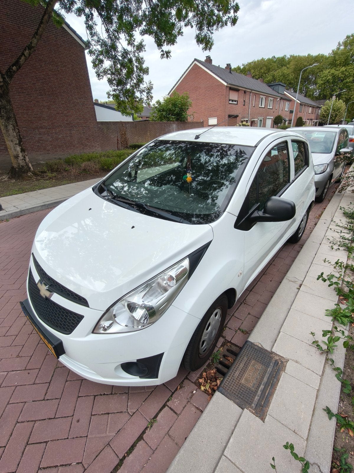 Chevrolet Spark 1.0 2012 Wit, Auto's, Voorwielaandrijving, 839 kg, 4 cilinders, Origineel Nederlands
