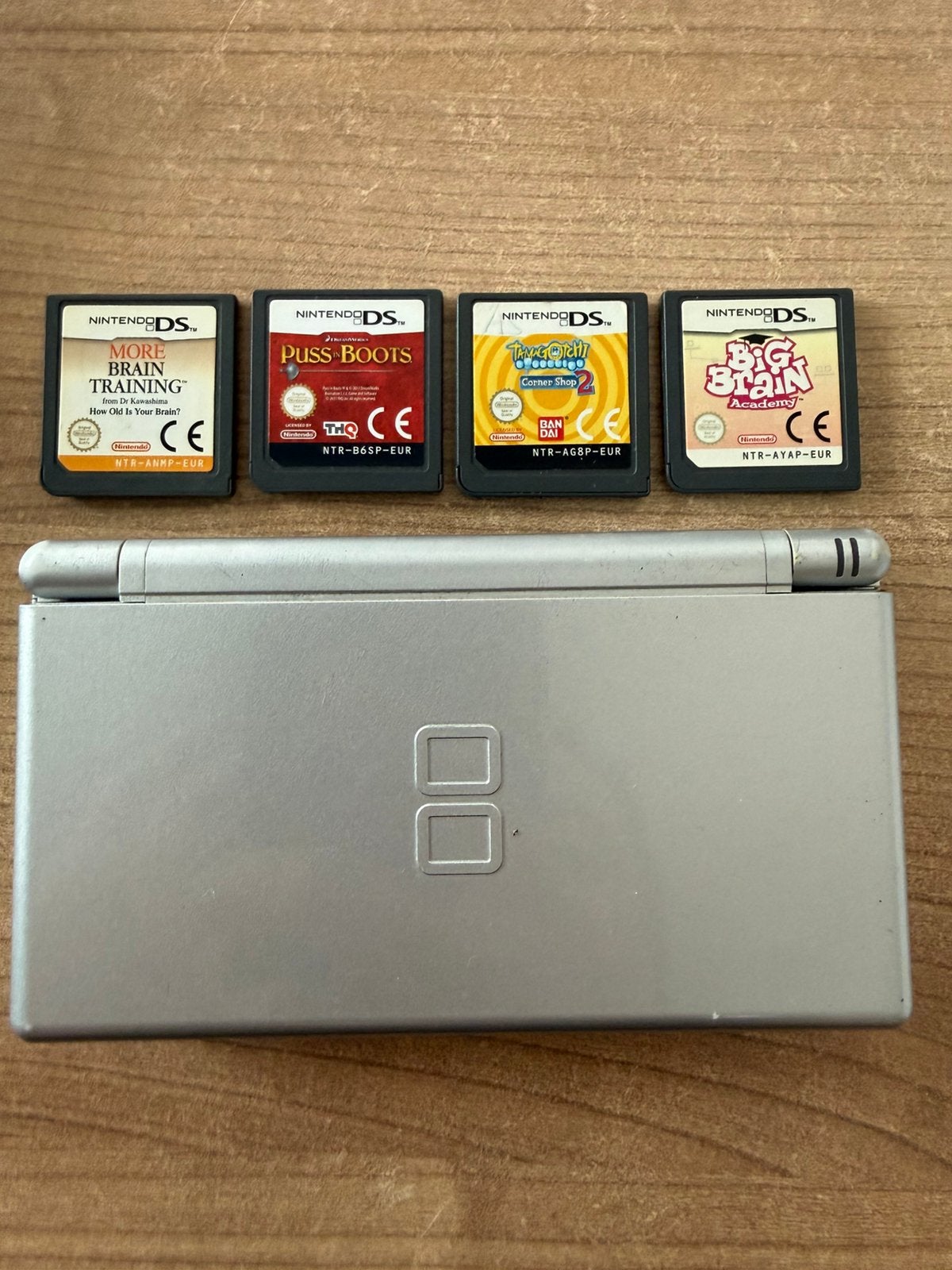 Nintendo DS met 4 speelkaarten, Spelcomputers en Games, Ophalen of Verzenden, Zo goed als nieuw, DS Lite