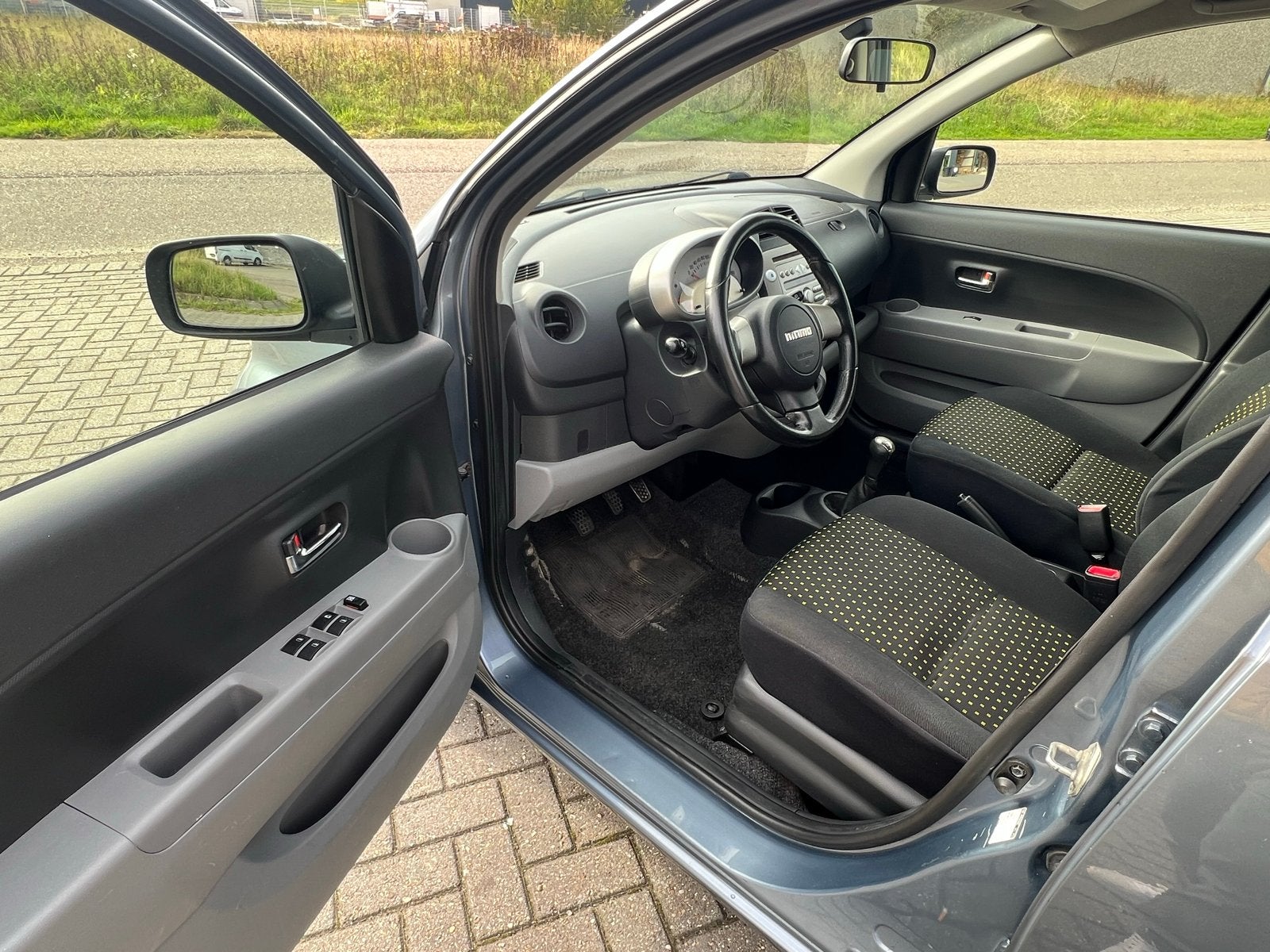 Daihatsu Sirion 1.0 51KW 2008 Grijs, Ophalen, Gebruikt, Daihatsu, Voor