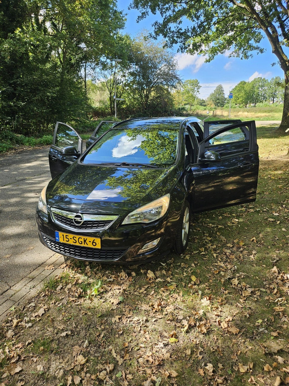 Opel Astra 1.4 Turbo 103KW ST 2011 Zwart, Auto's, Voorwielaandrijving, Stof, Multifunctioneel stuurwiel, Zwart