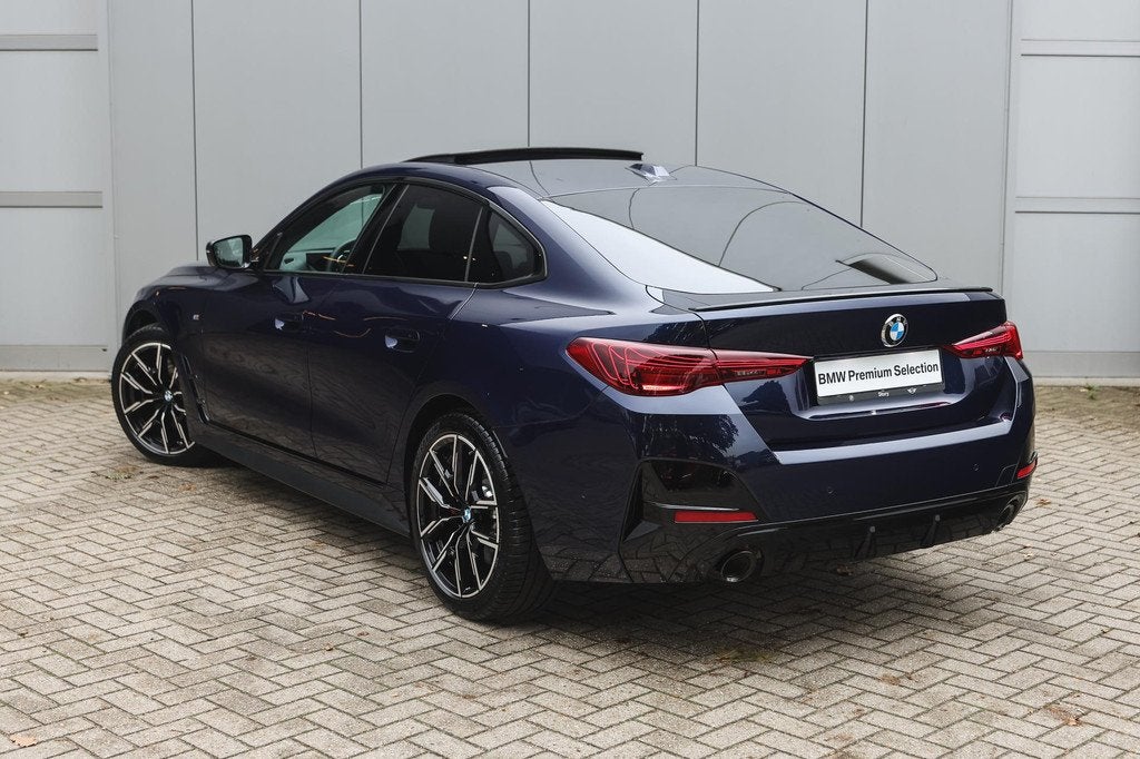 BMW 4 Serie Gran Coupé 430i xDrive High Executive M Sport A, Auto's, BMW, Gebruikt, Zwart, Blauw, Leder en Stof