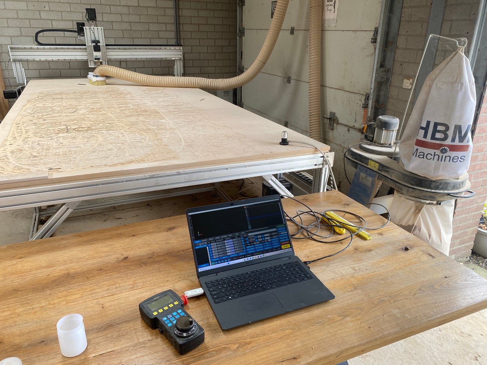 CNC-frees met stofafzuiging en accessoires, Ophalen