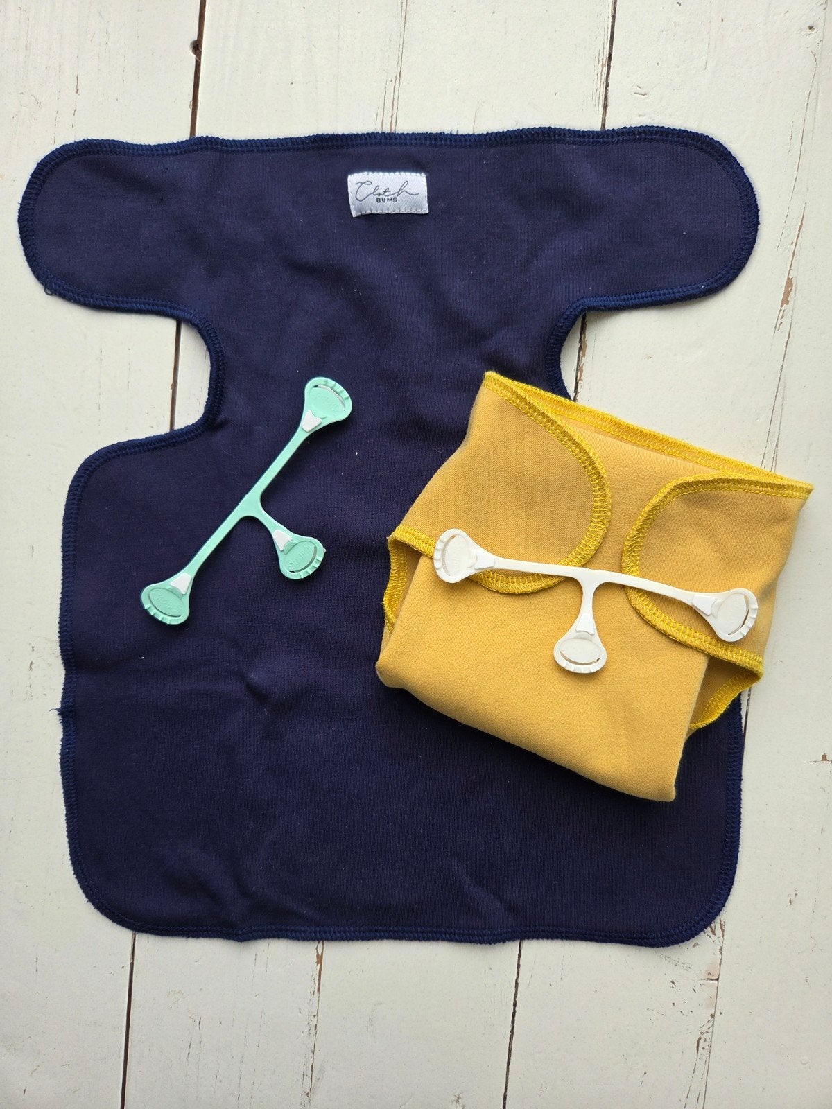 Cloth Bums newborn vouwluiers + luierklemmetjes, Ophalen of Verzenden, Zo goed als nieuw