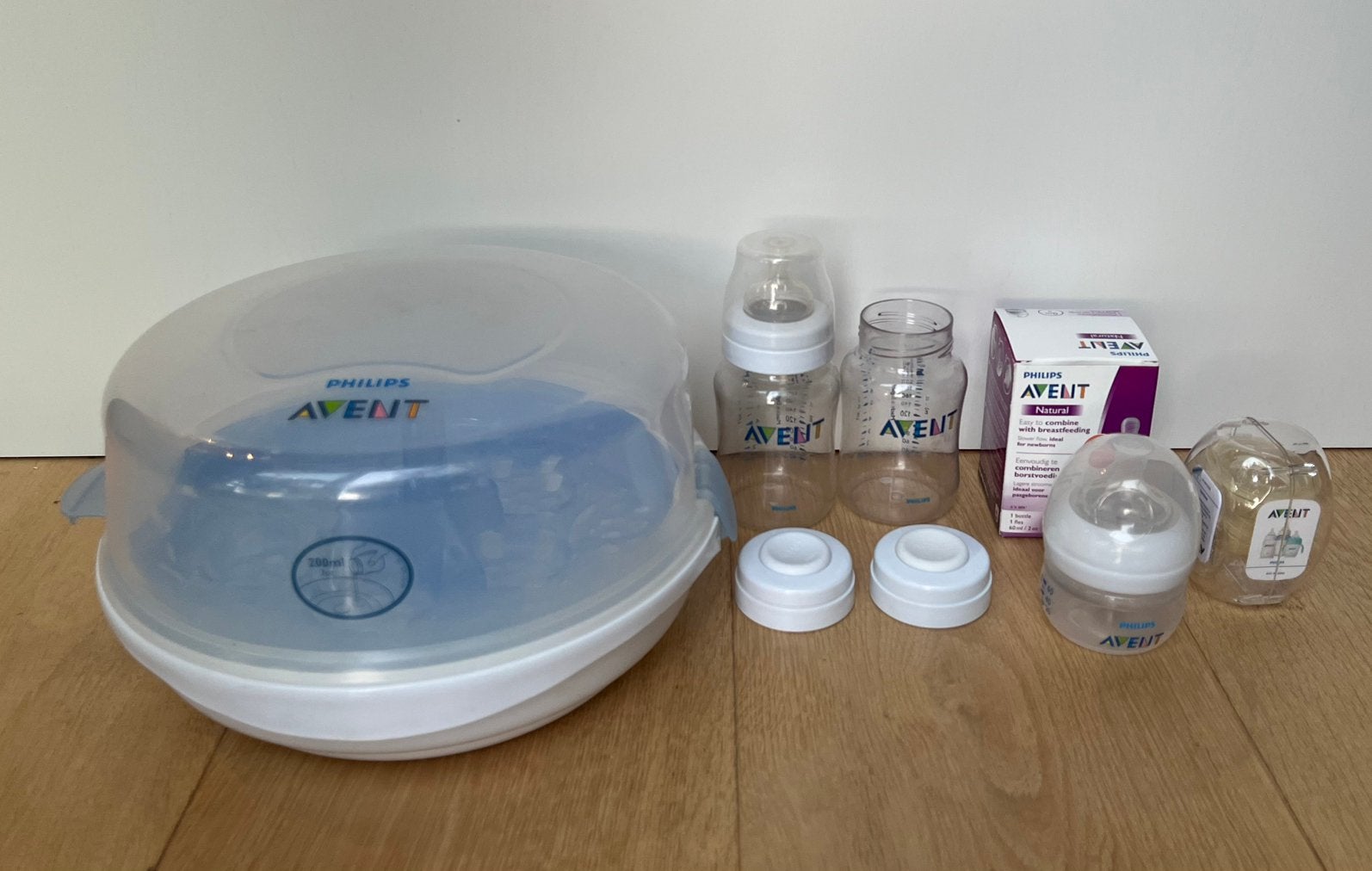 Philips Avent magnetron Sterilisator inclusief babyflessen, Sterilisator, Zo goed als nieuw, Inclusief flessen, Philips Avent