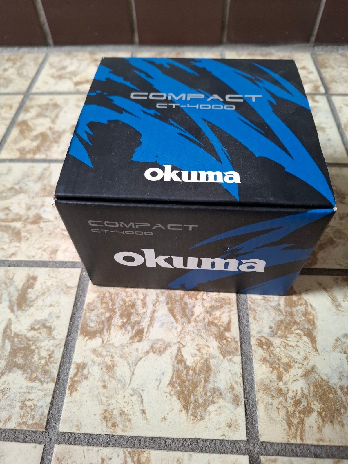 Nieuwe Okuma compact ct 4000 witvismolen, Ophalen of Verzenden, Nieuw, Molen