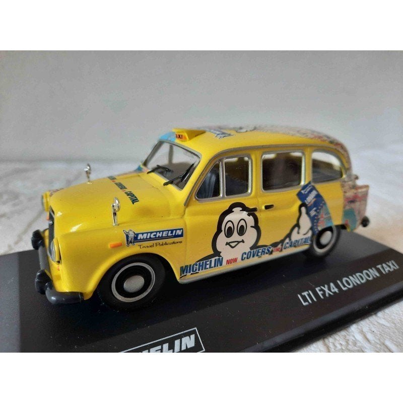 Austin LTI FX4 taxi london 1:43 Michelin, Ophalen of Verzenden, Zo goed als nieuw, Auto, Overige merken
