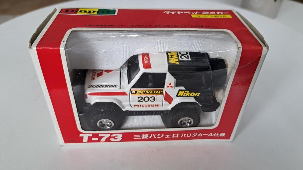 Dinpoy T-73 Mitsubishi Pajero Paris Dakar Style diapet, Hobby en Vrije tijd, Modelauto's | Overige schalen, Ophalen of Verzenden
