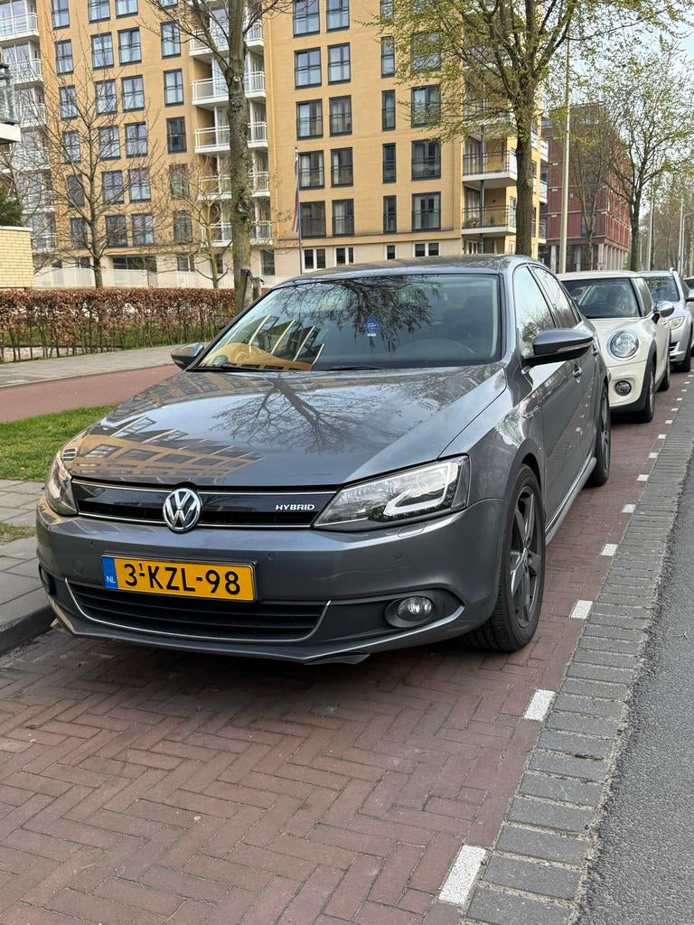 Volkswagen Jetta 1.4 TSI Hybrid 170pk 7-DSG 2013 Grijs, Auto's, Volkswagen, Origineel Nederlands, 1405 kg, Sedan, 149 pk