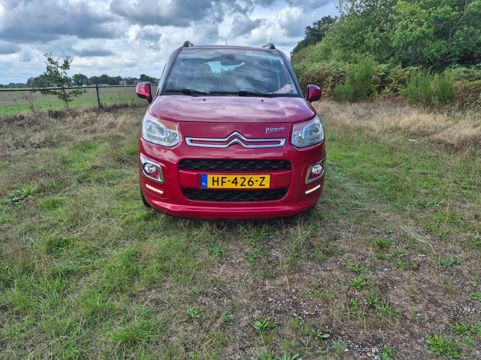 Citroën C3 Picasso 1.2 VTI 81KW/110PK 2015 Rood, Auto's, Citroën, Voorwielaandrijving, Beige, 620 kg, Origineel Nederlands