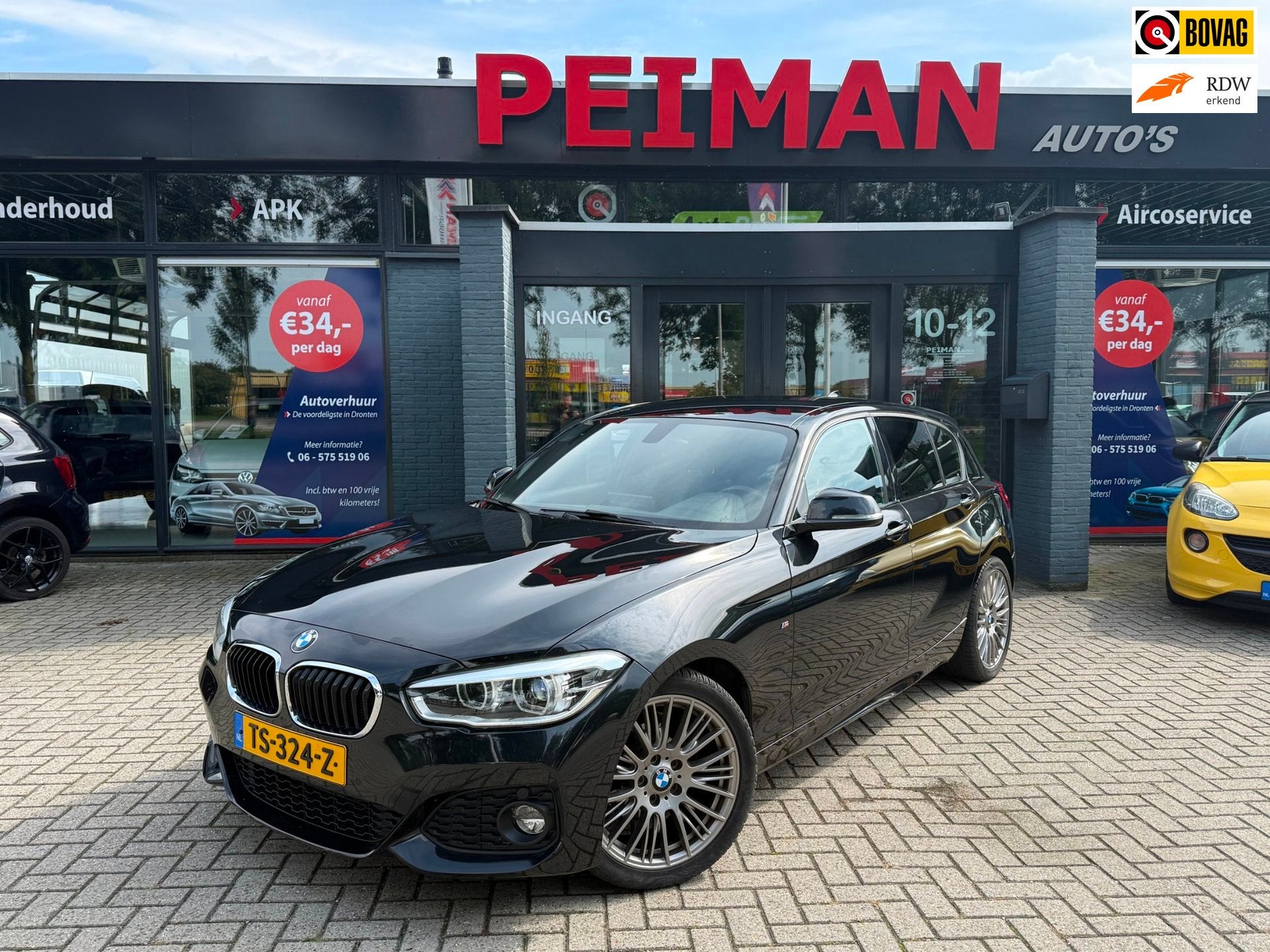 BMW 1-serie 118i High Executive | M Sport shadow | Stoelverw, Auto's, Gebruikt, Zwart, Origineel Nederlands, Bedrijf
