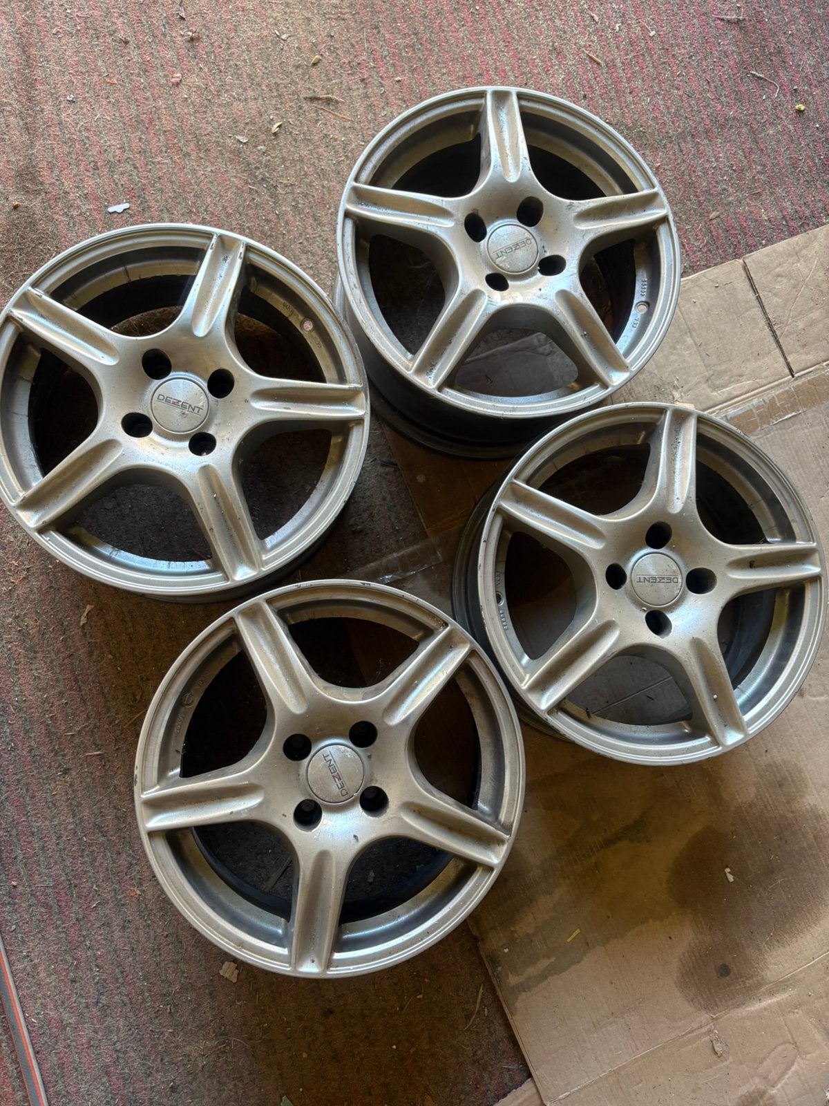Set van 4 gebruikte Dezent velgen - 16 inch, Auto diversen, Wieldoppen, Ophalen, Gebruikt