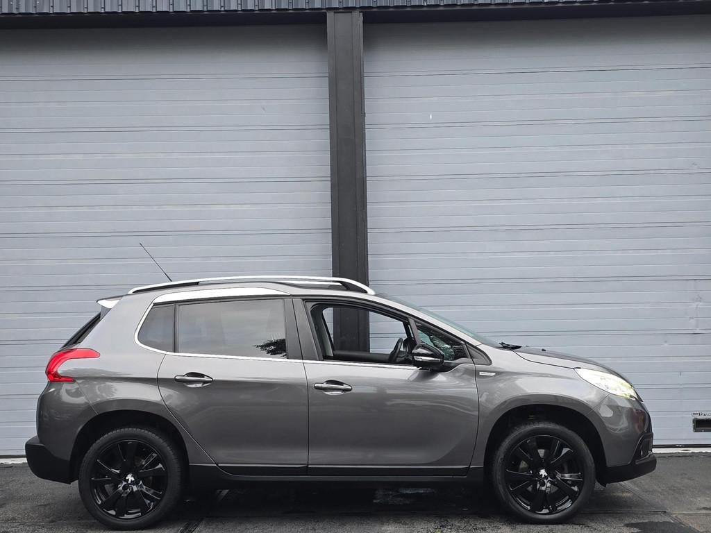 Peugeot 2008 1.2 PureTech Urban Cross, Auto's, Peugeot, Voorwielaandrijving, Gebruikt, 1270 kg, Leder en Stof