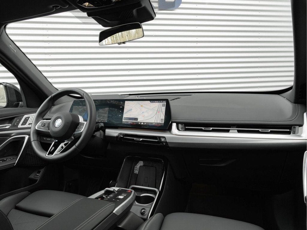 BMW X1 sDrive18i M-Sport Pro - Pano - Memoryzetel - Trekhaak, Auto's, BMW, 136 pk, 24 maanden, Zwart, Leder