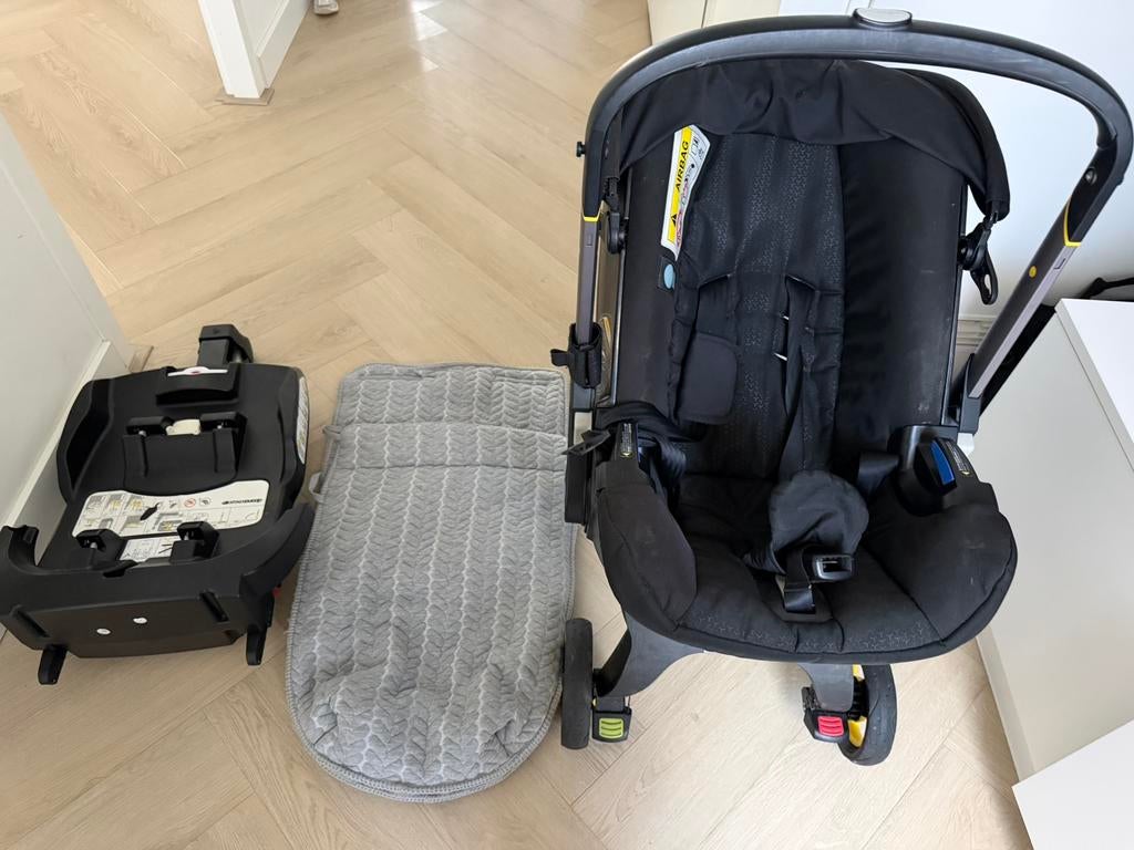 Doona incl isofix, voetenzak, doona tas en nieuwe regengoes, Ophalen, Gebruikt, Overige merken, Isofix