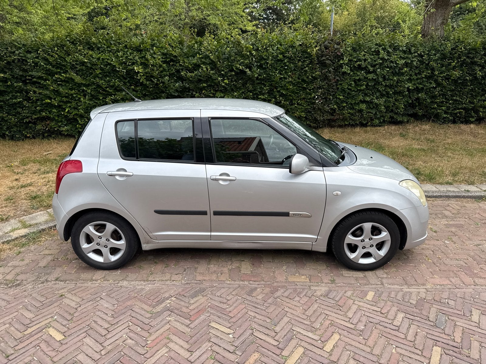 Suzuki Swift 1.3 5DRS 2007 Grijs, Voorwielaandrijving, 40 €/maand, Zwart, 965 kg