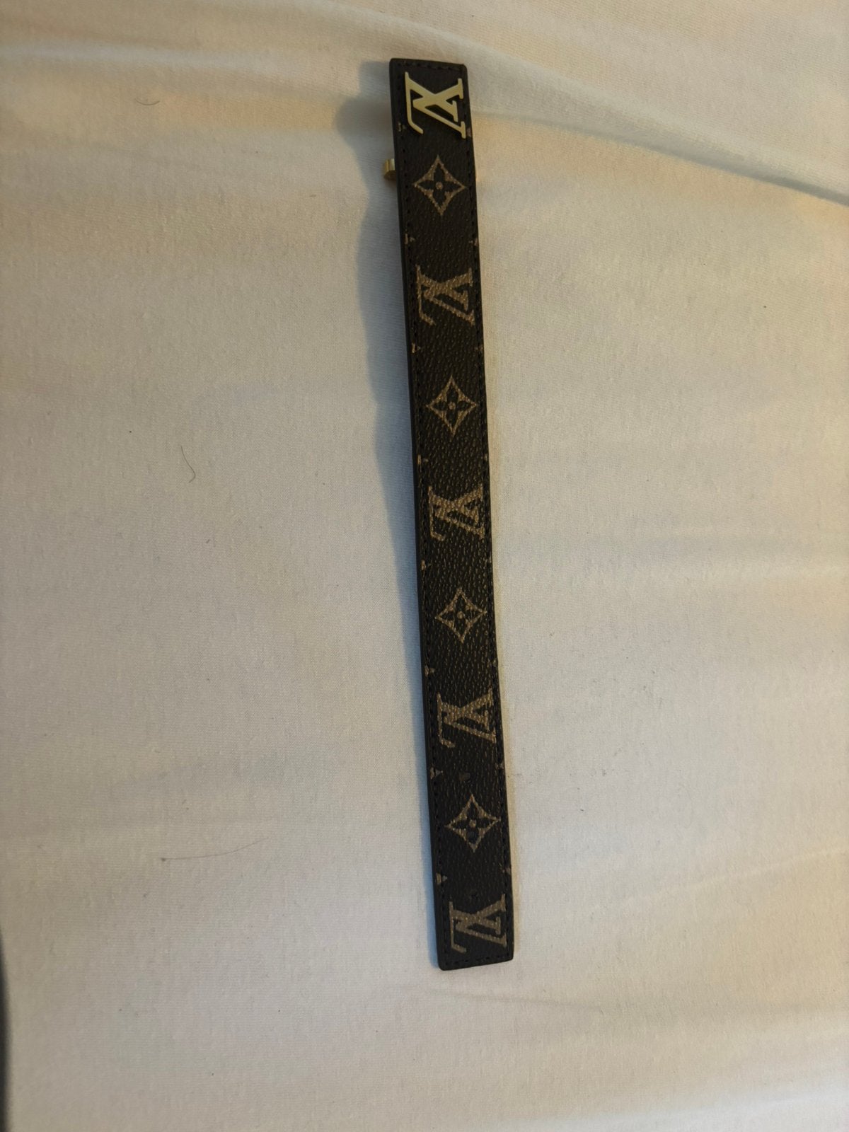 LV armband bruin met goud nieuw 0x gedragen, Ophalen of Verzenden, Nieuw, Bruin, 100 cm of meer