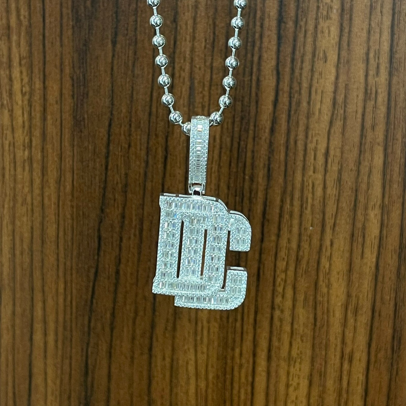 Zilveren DC (dream chasers) hanger iced out, Ophalen of Verzenden, Nieuw, Zilver, Zilver