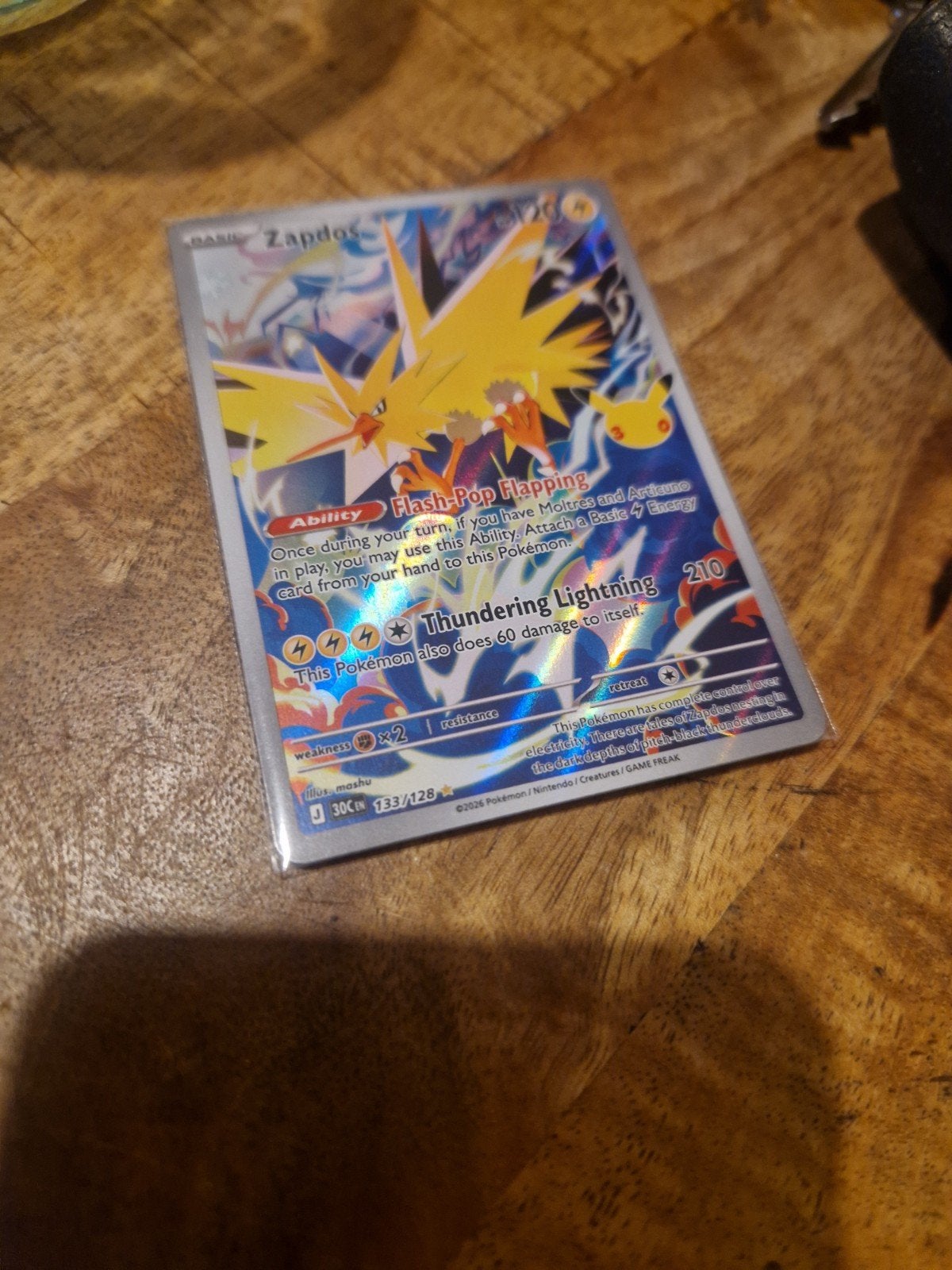 Zapdos Pokémon Kaart 133/128 (Foil), Hobby en Vrije tijd, Ophalen of Verzenden, Zo goed als nieuw, Losse kaart, Foil