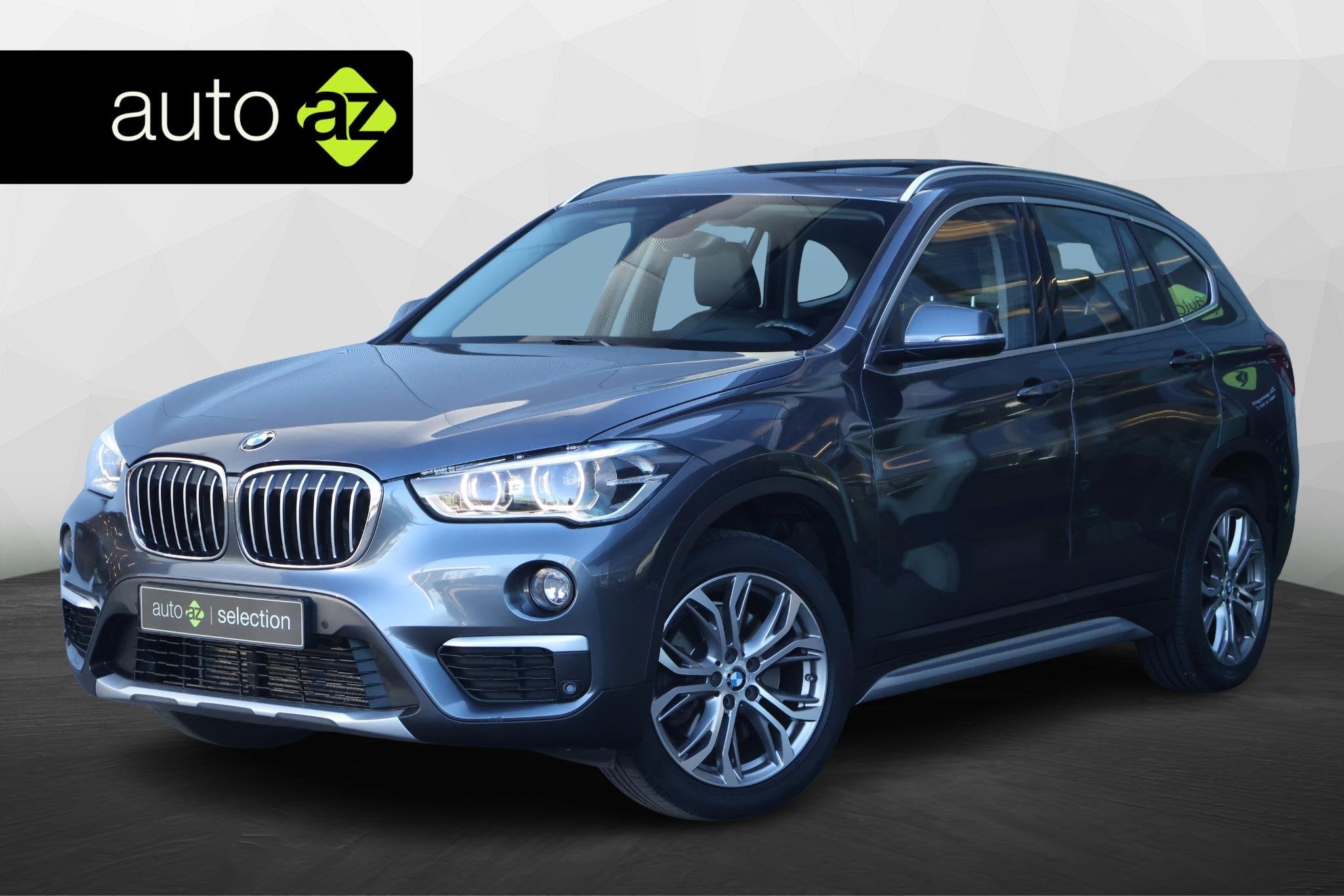 BMW X1 xDrive20i High Executive / Panorama / Sportstoelen, Auto's, 1998 cc, Stof, Gebruikt, 2000 kg