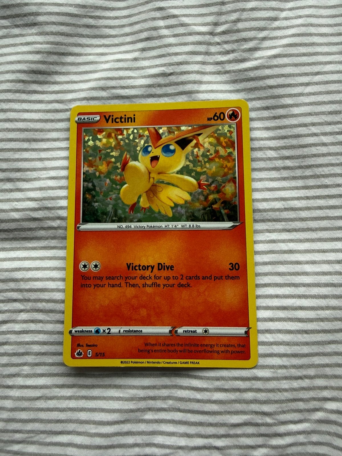 Victini holo pokemon kaart, Hobby en Vrije tijd, Ophalen of Verzenden, Zo goed als nieuw
