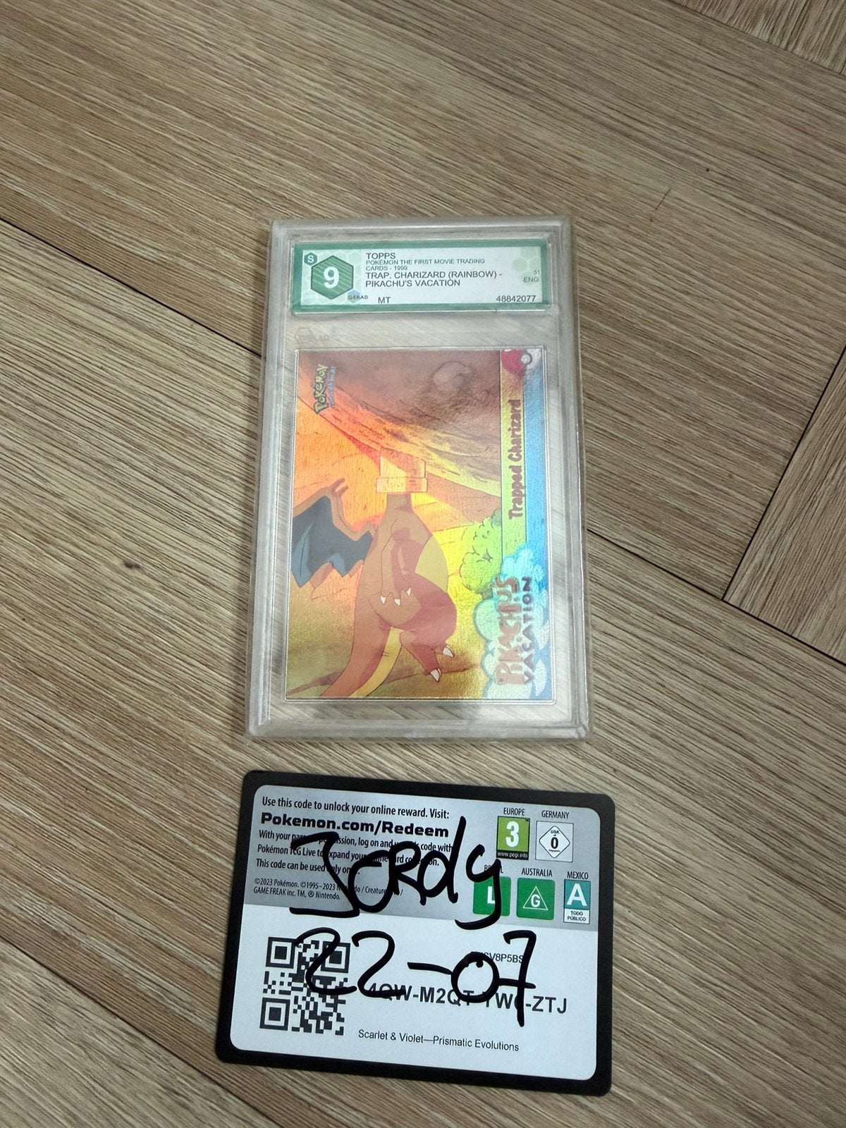 Charizard rainbow foil topps blue logo, Ophalen of Verzenden, Zo goed als nieuw, Foil