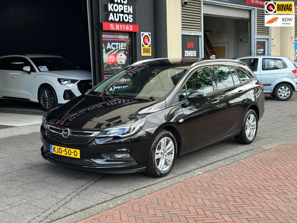 Opel Astra Sports Tourer 1.4 Business+ Automaat Airco Navi C, Auto's, Opel, Stof, Gebruikt, Euro 6, 150 pk