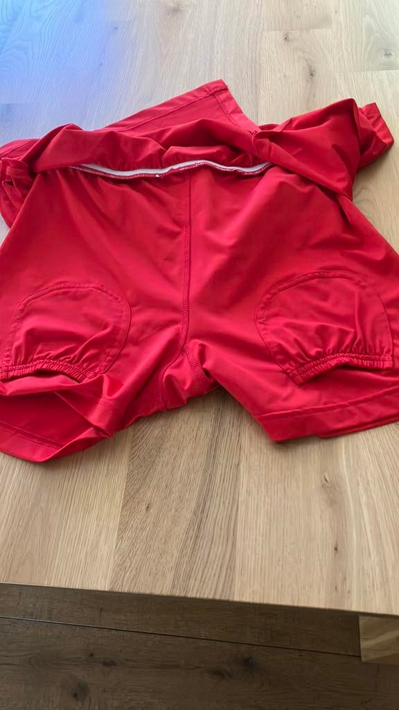 Tennis rok/ broek. Nieuw. Asics. Mt 48, Sport en Fitness, Tennis, Overige merken, L00, Nieuw, Ophalen of Verzenden