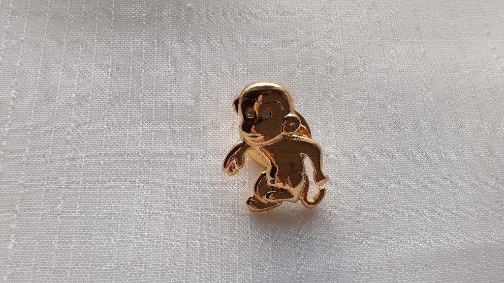 Kleine aap, pin, broche, goudkleurig (41), Overige materialen, Minder dan 4 cm, Ophalen of Verzenden, Zo goed als nieuw