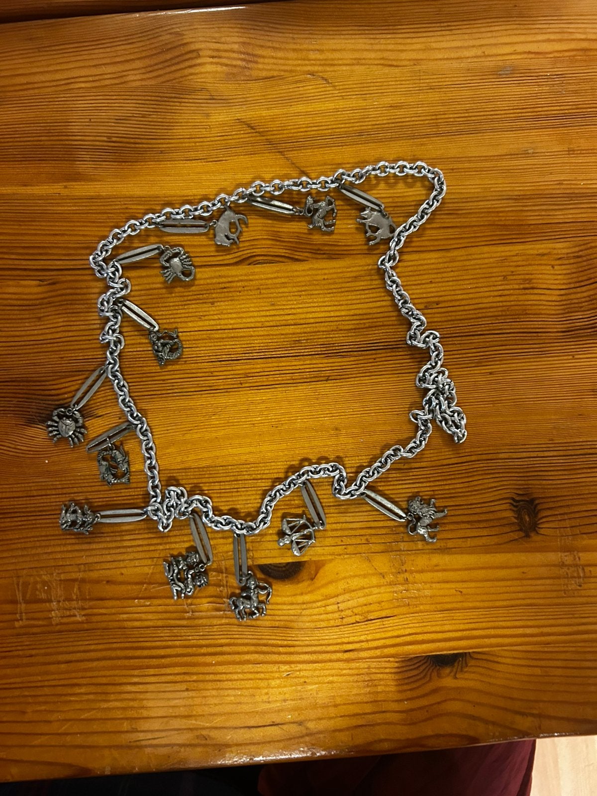 Verzilverde hangers van de 12 sterrenbeelden, Ophalen of Verzenden, Gebruikt, Zilver, Overige materialen