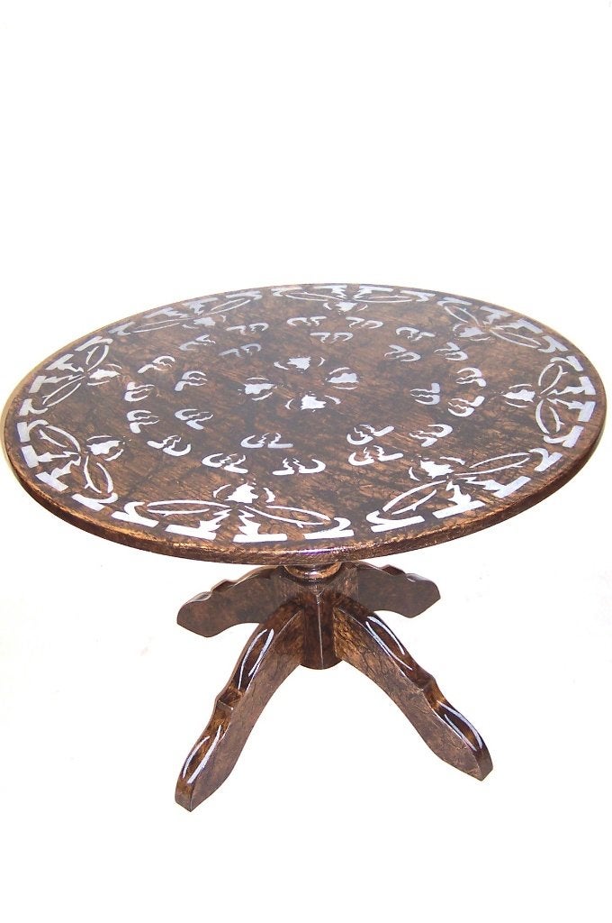 gedecoreerde salontafel, Ophalen