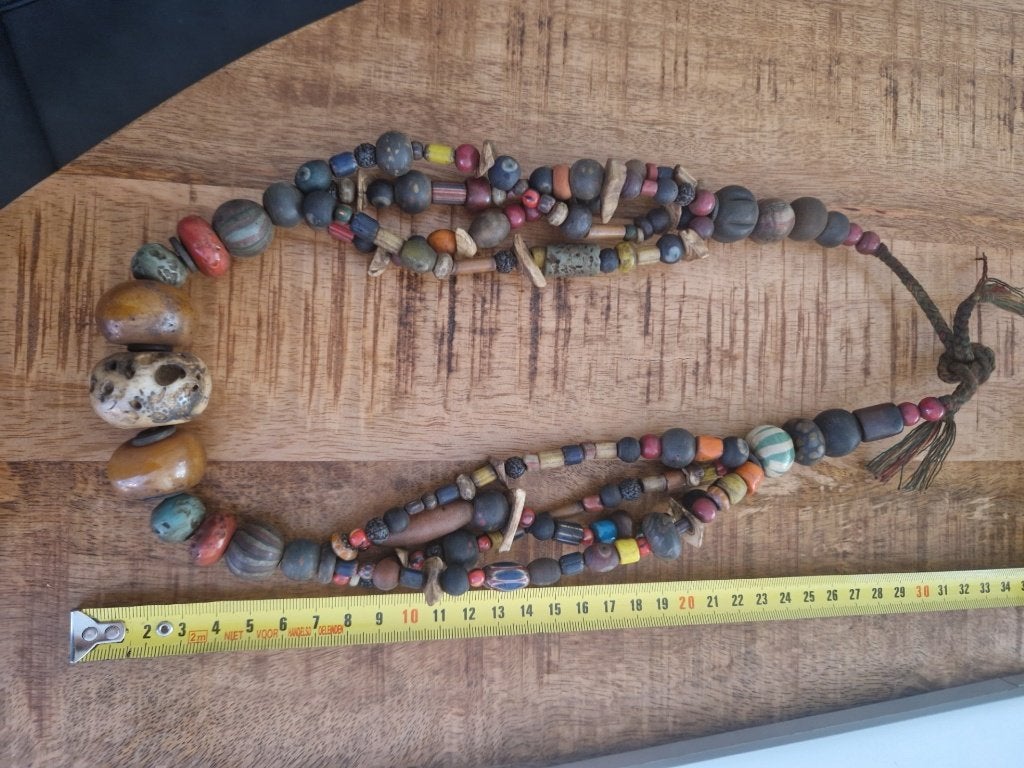Etnische ketting met amberkralen en been., Ophalen of Verzenden