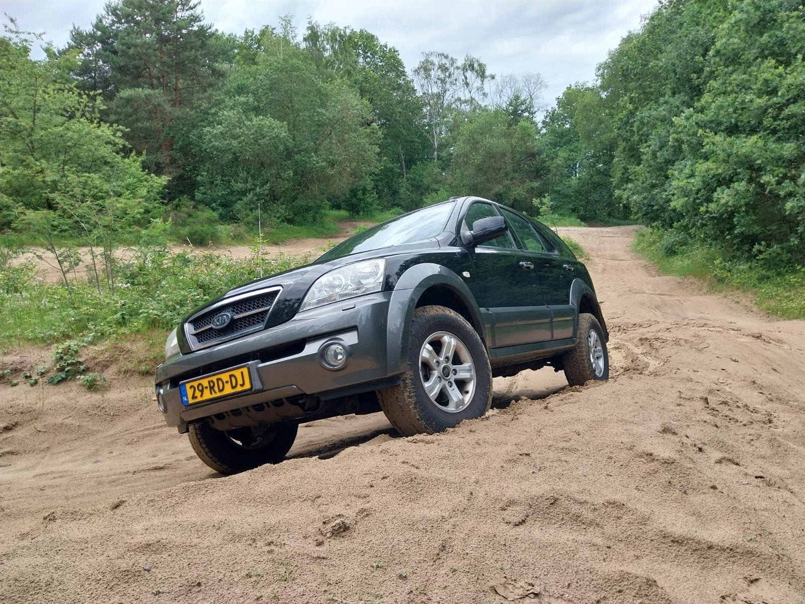Nette goede Sorento 2.4i EX LUXE VOLWAARDIGE 4X4, 4 cilinders, 138 pk, Zwart, Handgeschakeld