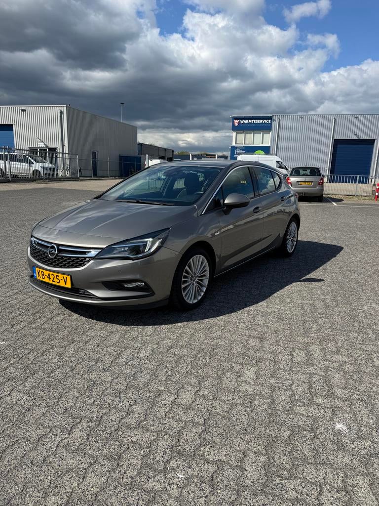 Opel Astra 1.4 Turbo 110KW 5D 2016 Grijs, Auto's, Opel, Voorwielaandrijving, 620 kg, Bedrijf, Handgeschakeld