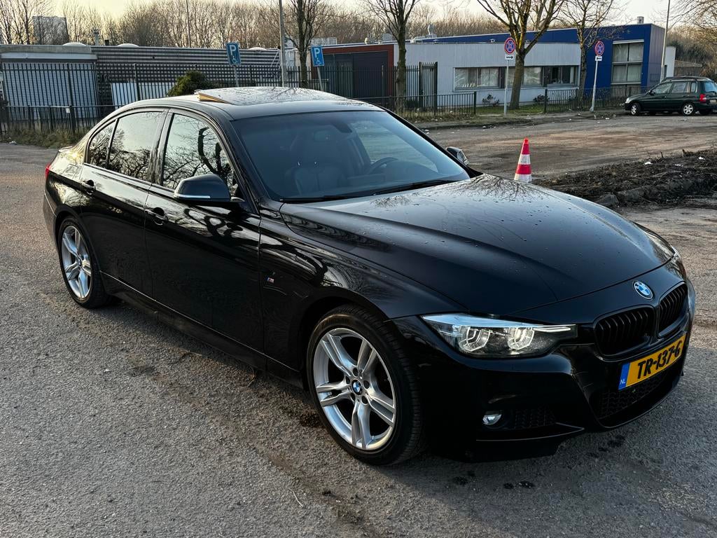 BMW 3-Serie M Sport Edition 320i 184pk Aut 2018 Zwart, Auto's, 1998 cc, Achterwielaandrijving, 1800 kg, 4 cilinders