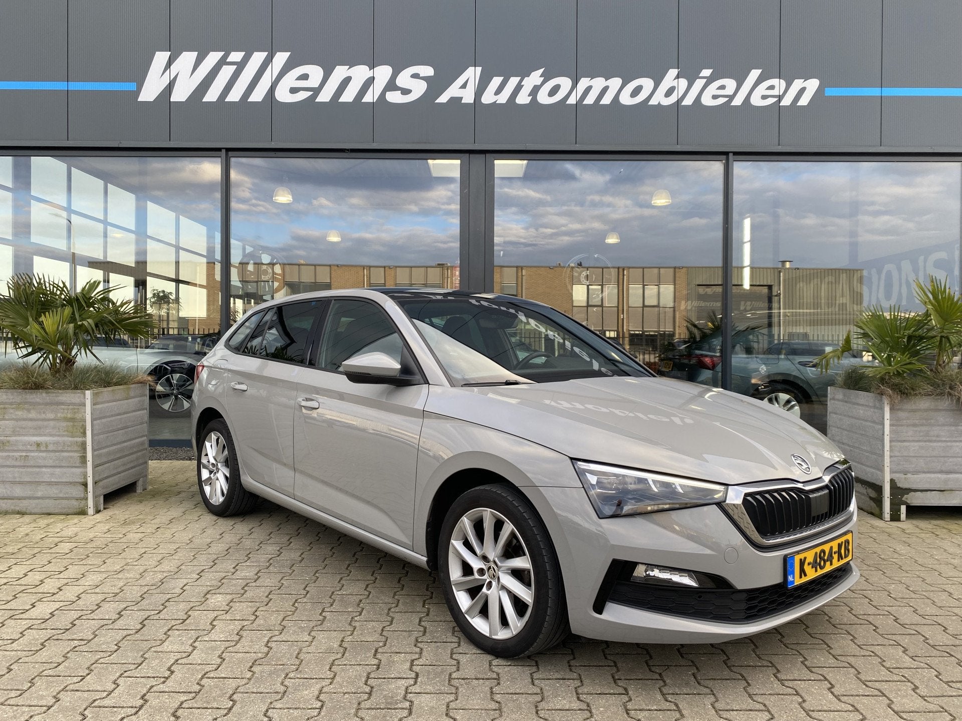 Skoda Scala 1.0 TSI Sport Business Panorama Dak, Cruise Cont, Auto's, Dealer onderhouden, Scala, Gebruikt, Euro 6