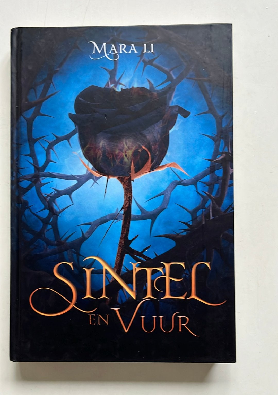 Boek: SINTEL EN VUUR van Mara Li, Ophalen of Verzenden, Zo goed als nieuw