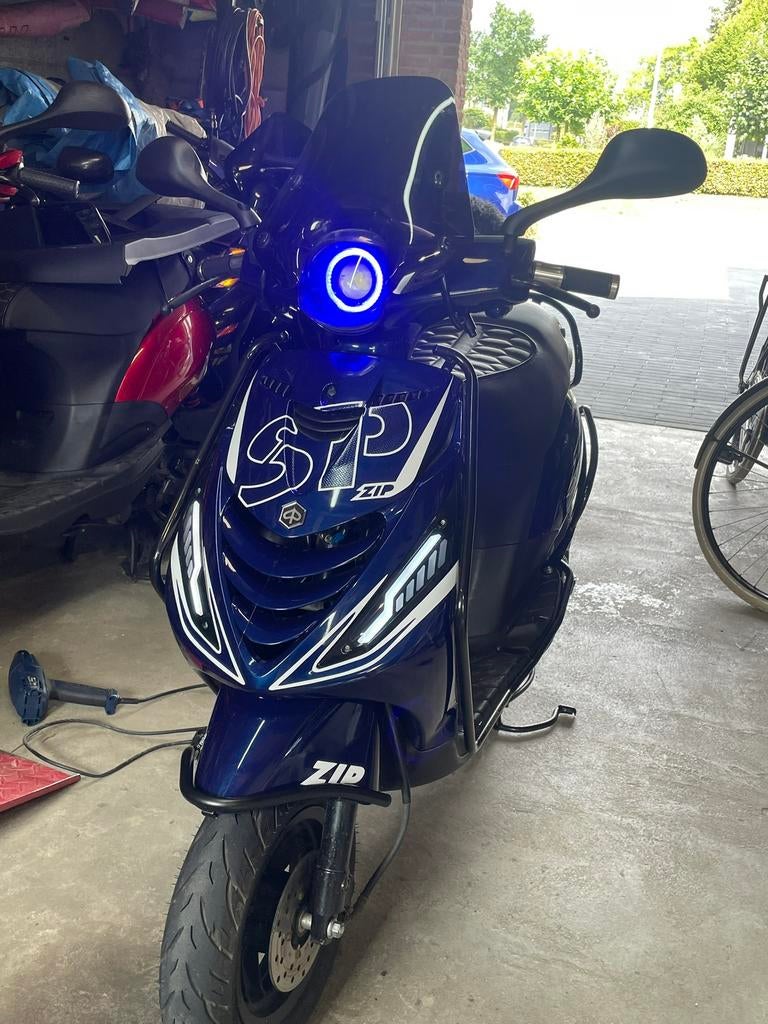 Angel eye met rode ring en blauwe ring, Ophalen of Verzenden