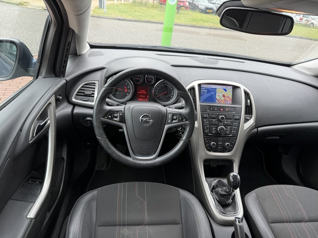 Opel Astra Sports Tourer 1.4 Turbo Edition | trekhaak | airc, Auto's, Gebruikt, 4 cilinders, Blauw, Origineel Nederlands