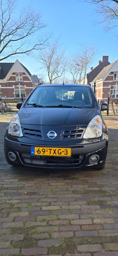 Nissan Pixo 1.0 50KW 5D 2010 Zwart, Auto's, Nissan, Voorwielaandrijving, Stof, 4 stoelen, Elektrische ramen