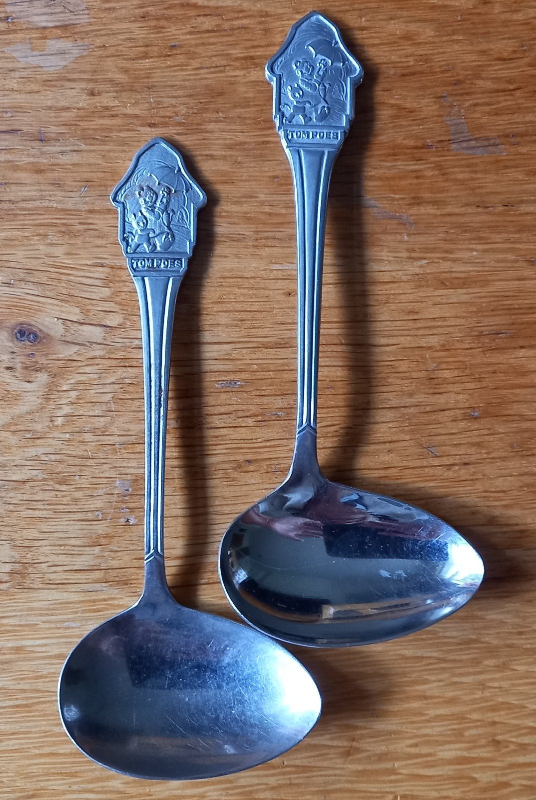 2 Dwarslepeltjes Tom Poes Sola, Ophalen of Verzenden, Rvs of Chroom