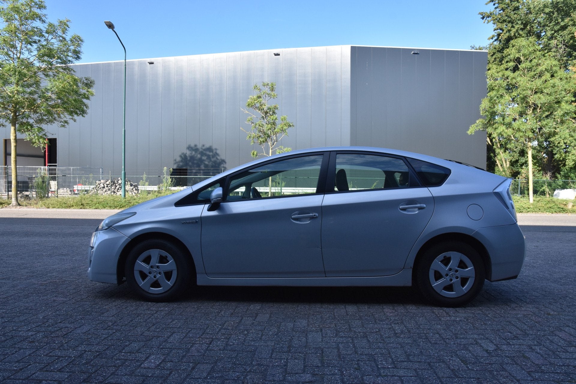Toyota Prius 1.8 Comfort (bj 2012, automaat), Auto's, 136 pk, Gebruikt, Zwart, 4 cilinders