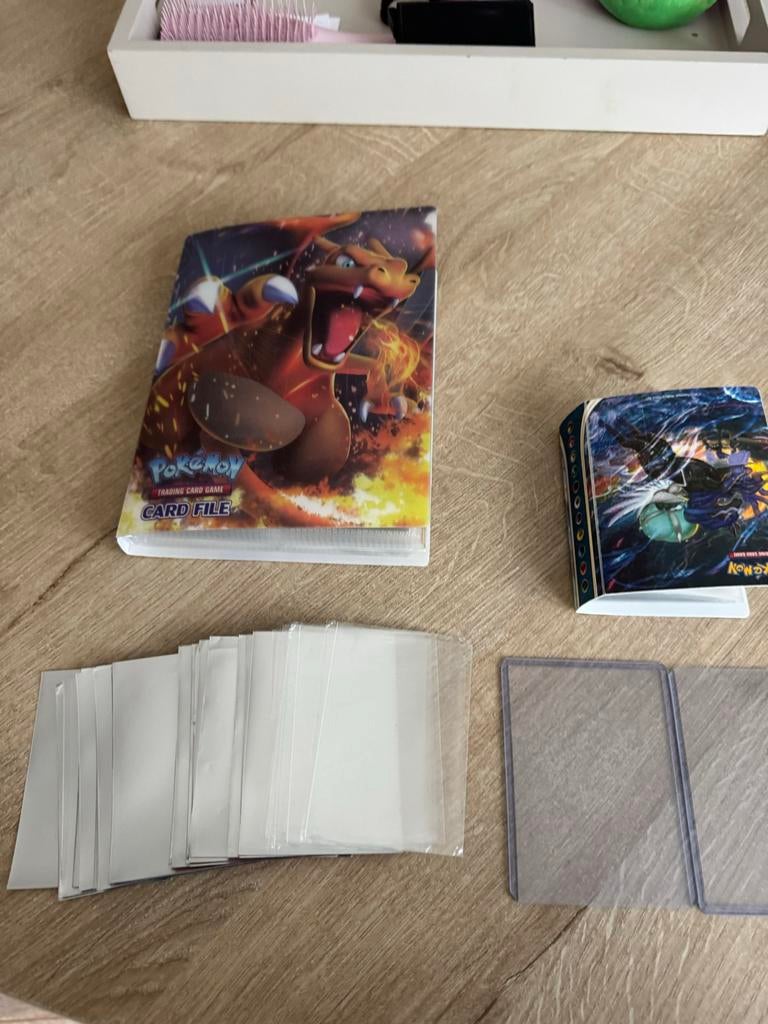 Pokémon kaarten en mapjes, Ophalen of Verzenden, Gebruikt, Meerdere kaarten