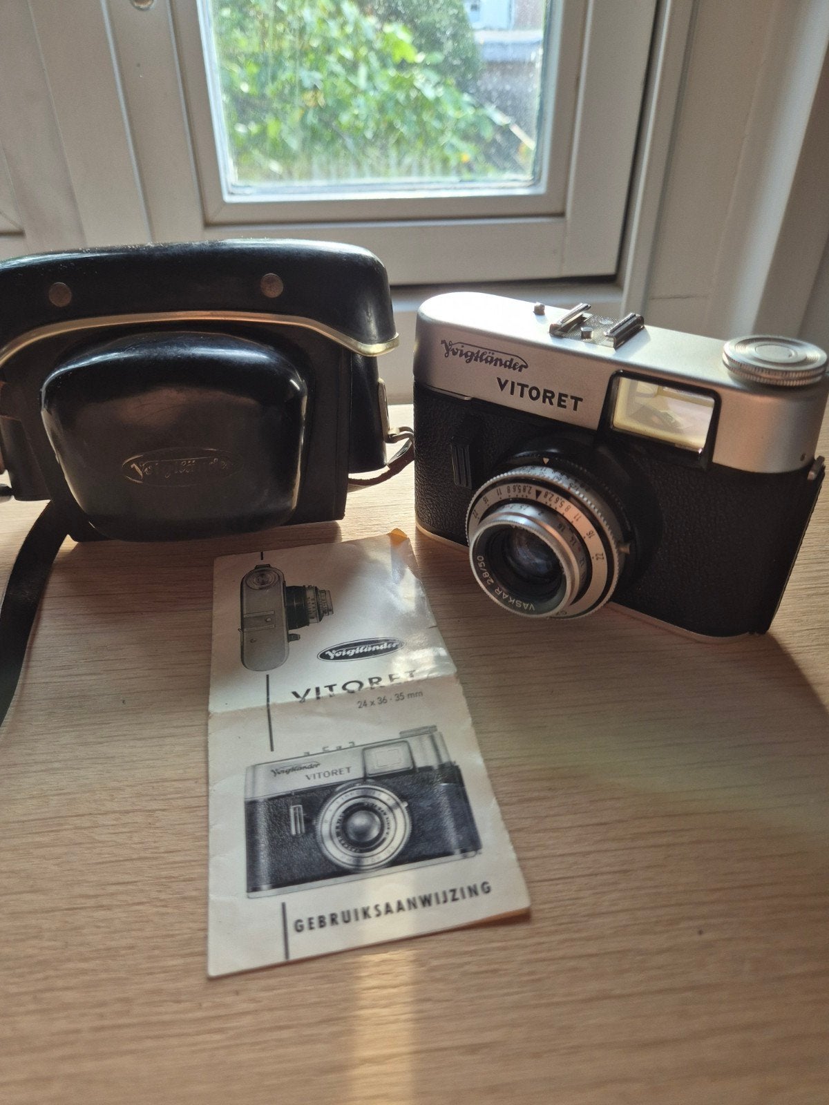 Voigtländer Vitoret 35mm compactcamera met tas, handleiding, Audio, Tv en Foto, Ophalen of Verzenden, Compact, Overige Merken