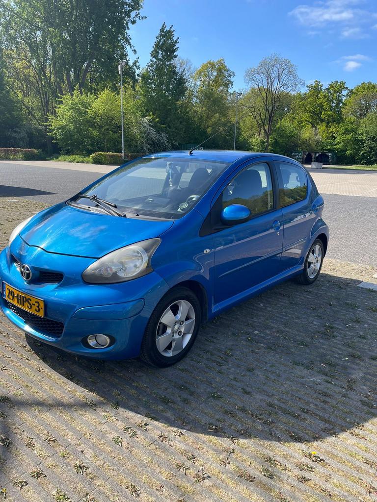 Toyota Aygo 1.0 12V Vvt-i 5DRS 2009 Blauw, Auto's, Toyota, Voorwielaandrijving, 68 pk, Origineel Nederlands, Handgeschakeld