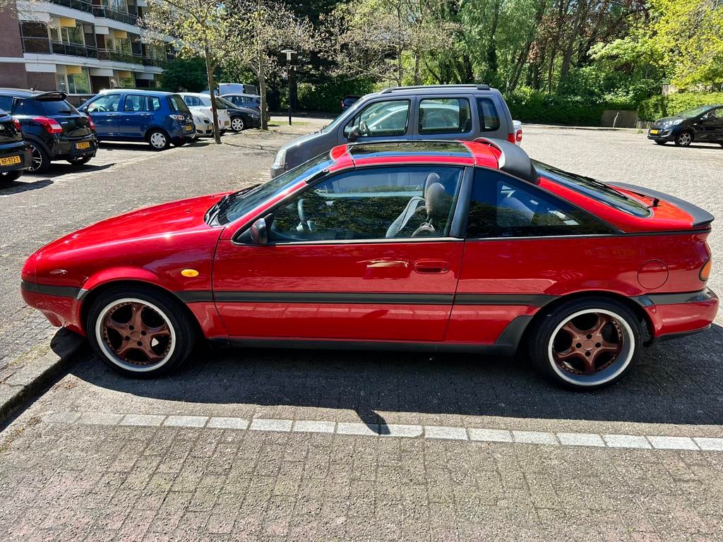Nissan 100 NX 1.6 U9 1991 Rood, Auto's, Voorwielaandrijving, 40 €/maand, 4 cilinders, Origineel Nederlands