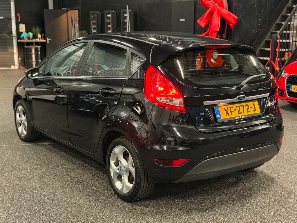 Ford Fiesta 1.25 Titanium XENON/AIRCO/CLIMATE/MULTIMEDIA/5-D, Voorwielaandrijving, Euro 5, Stof, 1242 cc