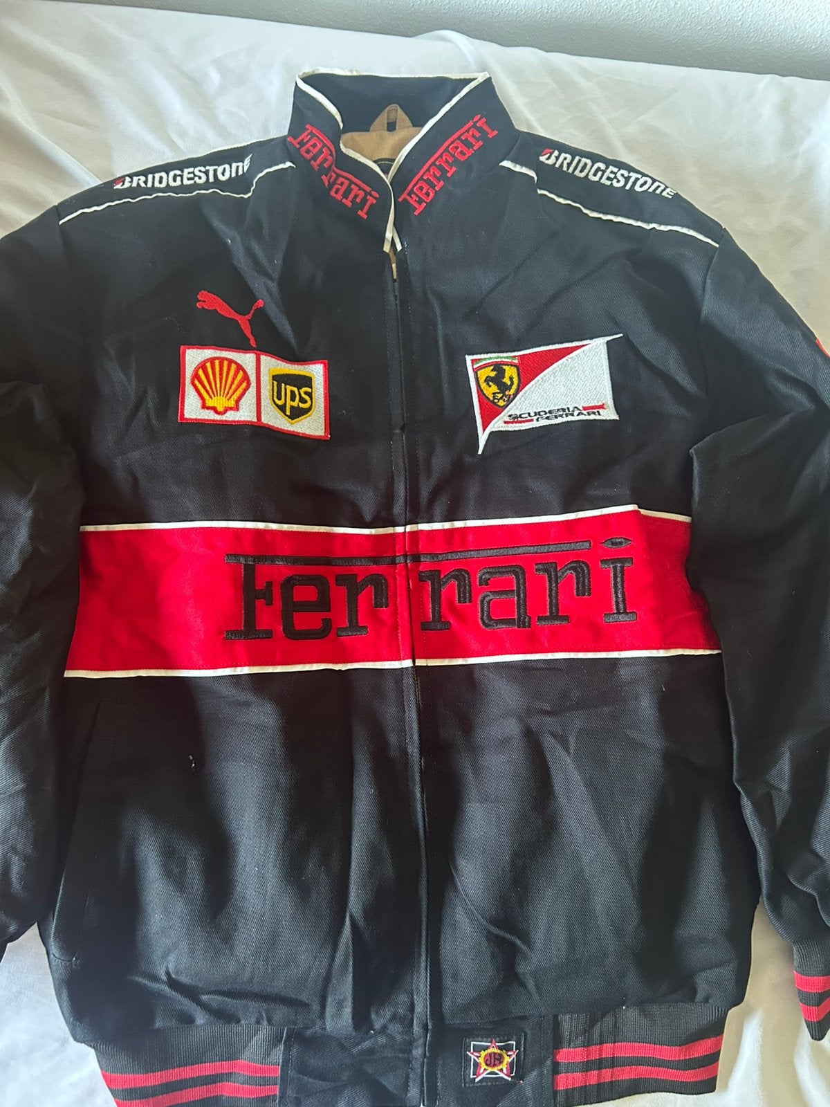 Ferrari nascar jas maat L in nieuw staat, Ophalen of Verzenden, Zo goed als nieuw, Maat 52/54 (L), Zwart